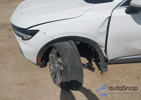 2023 Buick Envision Essence Fwd z USA, uszkodzony, nr VIN LRBFZNR47PD127851